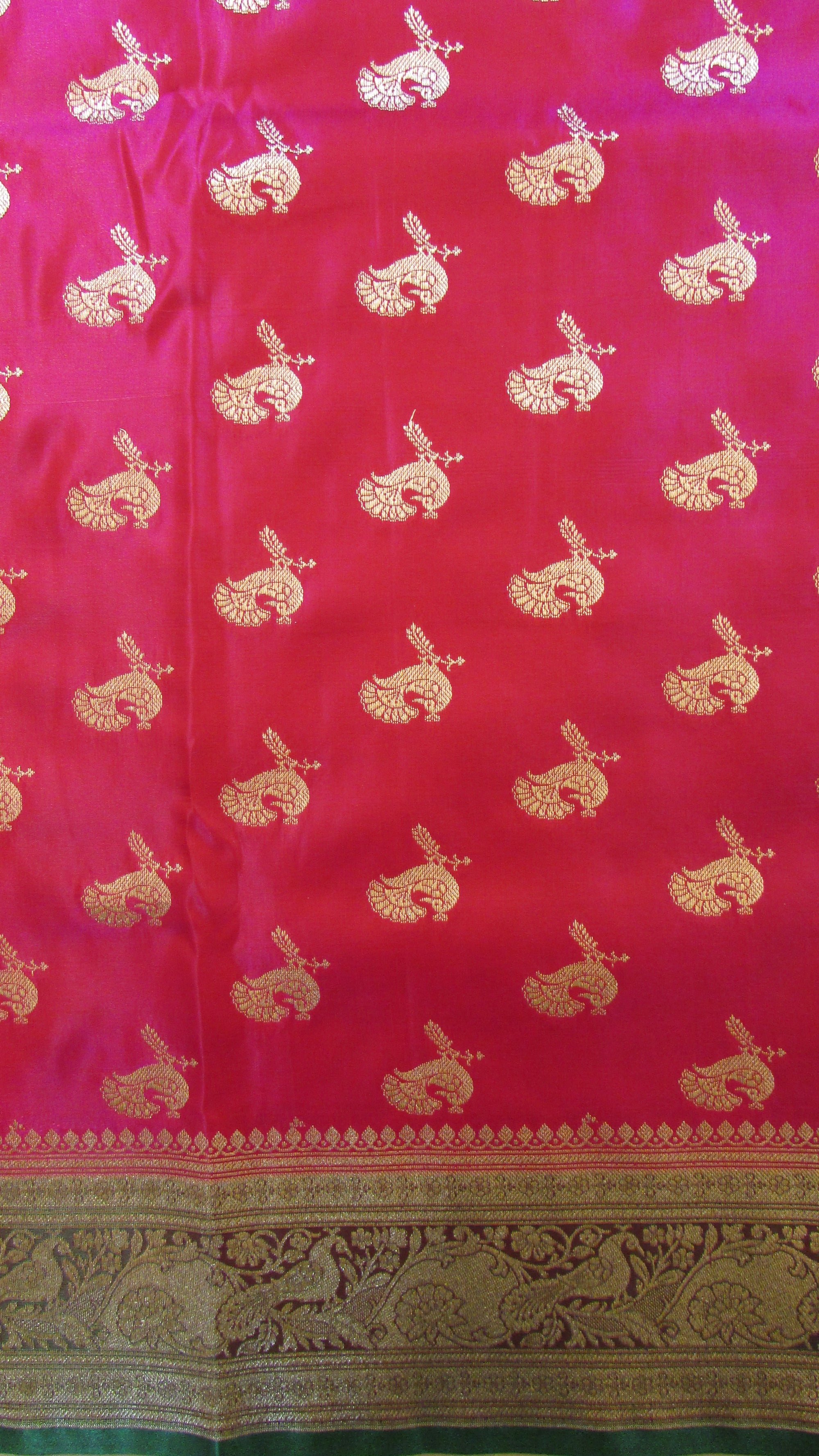 Saugandh Women's Magenta Banarasi Silk Saree by Saundarya